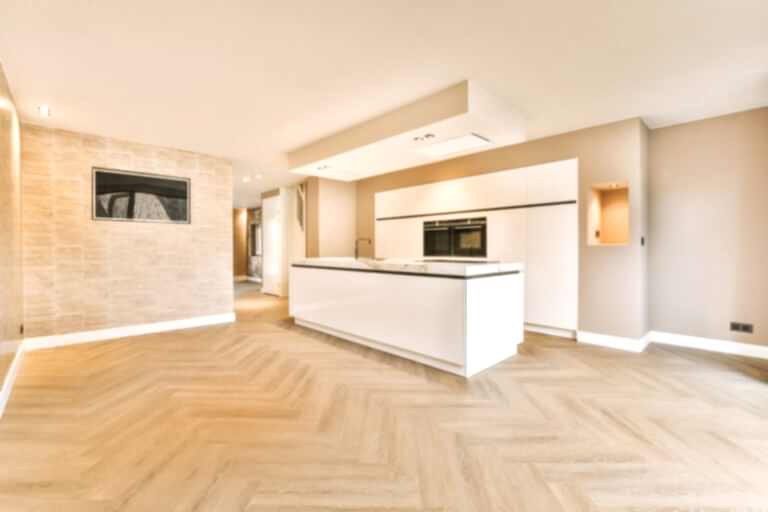 A minimalist kitchen with a block system in white design in a modern, cozy house