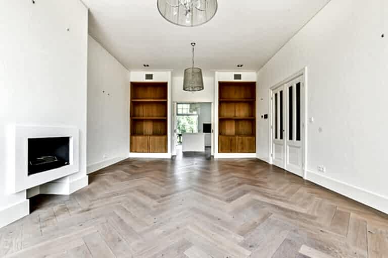 luxury spacious room with wooden style shelves and cabinets